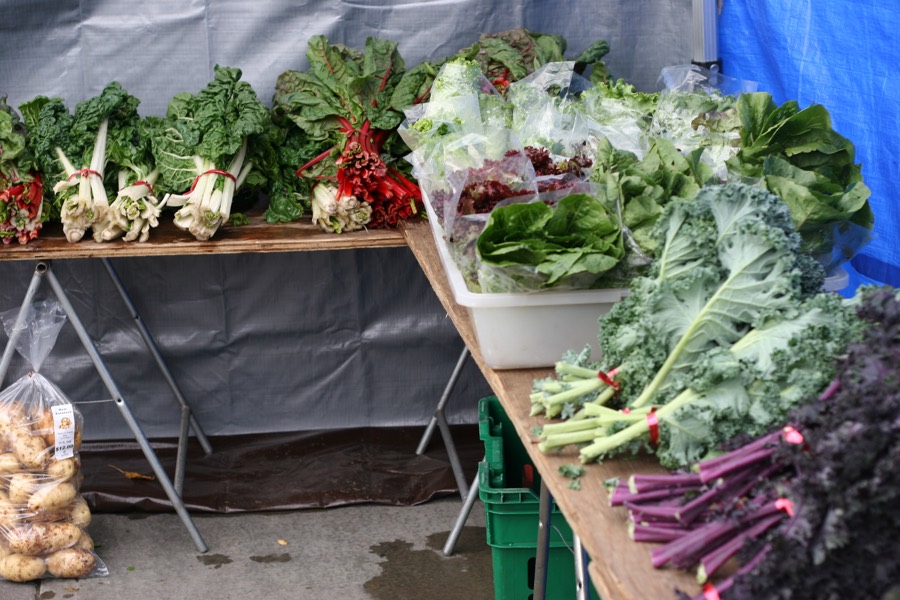 Fresh greens at a market table